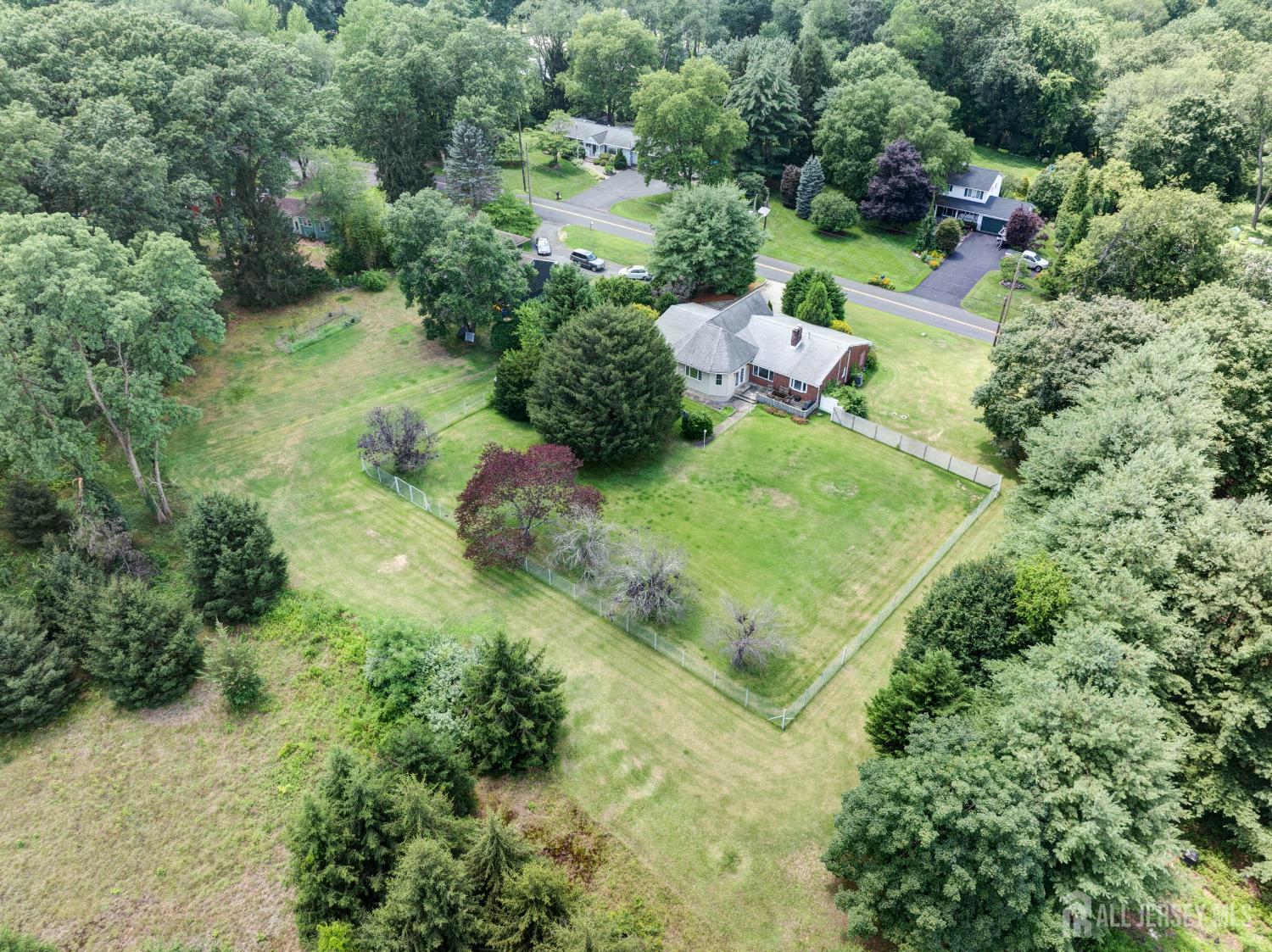 294 Fresh Ponds Road North Brunswick, NJ 08902 - Photo 46 of 53 an aerial view of a house with a yard