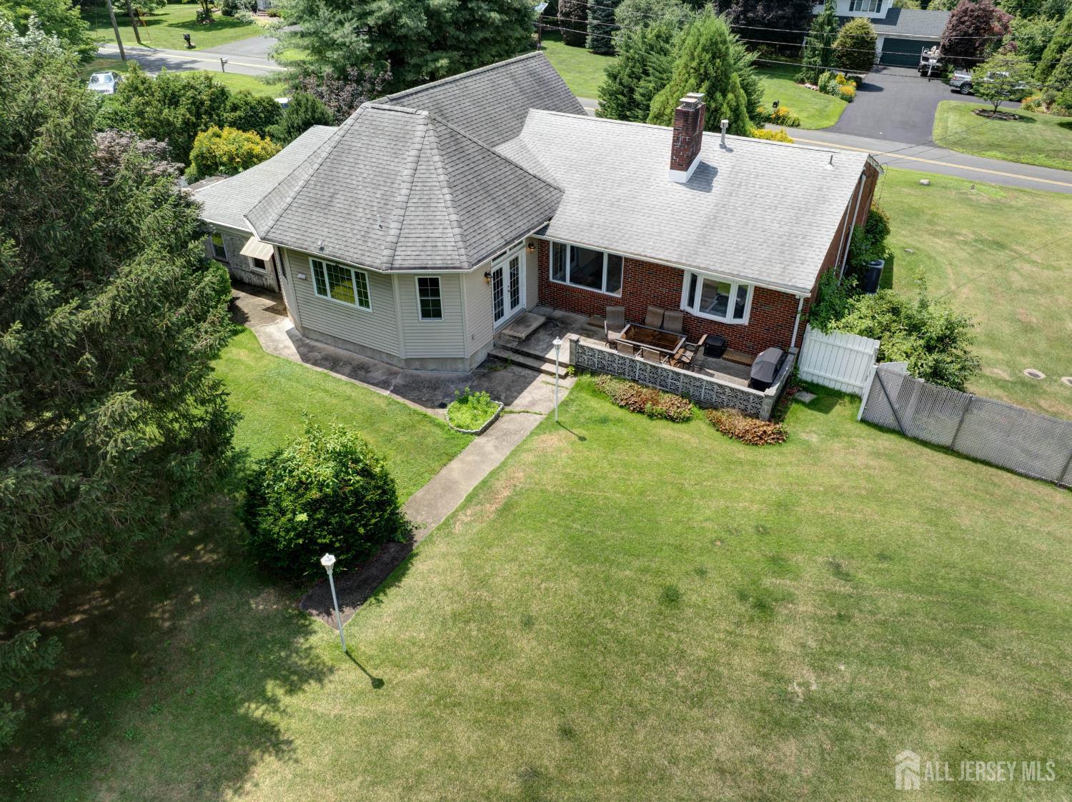 294 Fresh Ponds Road North Brunswick, NJ 08902 - Photo 51 of 53 an aerial view of a house with swimming pool and patio