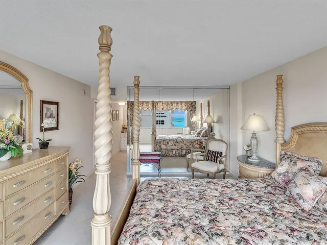 a bathroom with a granite countertop sink mirror and a