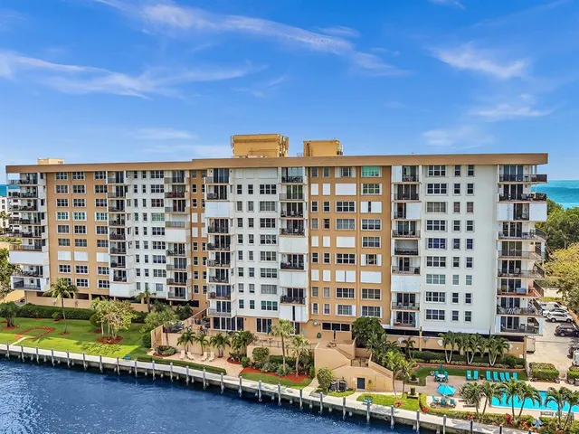 a view of building with yard