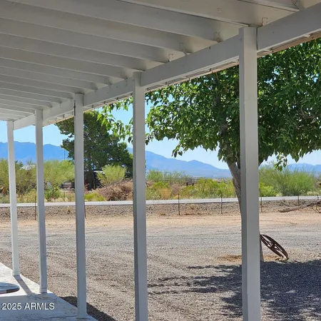 a view of a room with a large window
