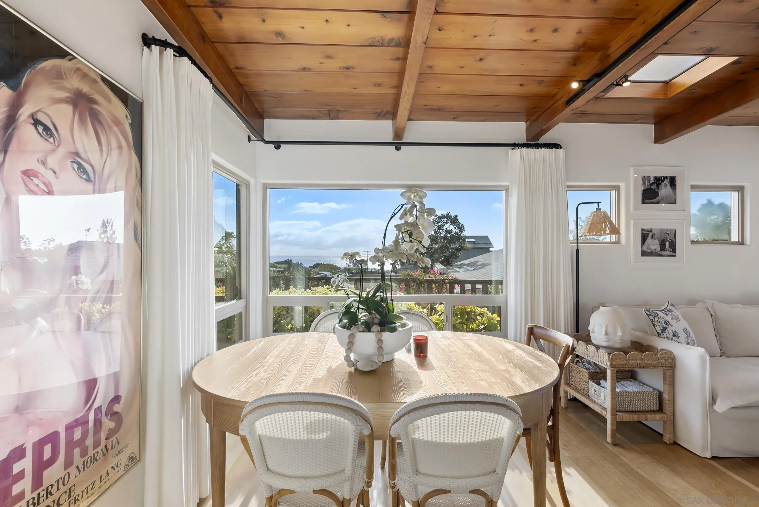 520 10th Street Del Mar, CA 92014 - Photo 5 of 9 a view of a dining room with furniture window and wooden floor