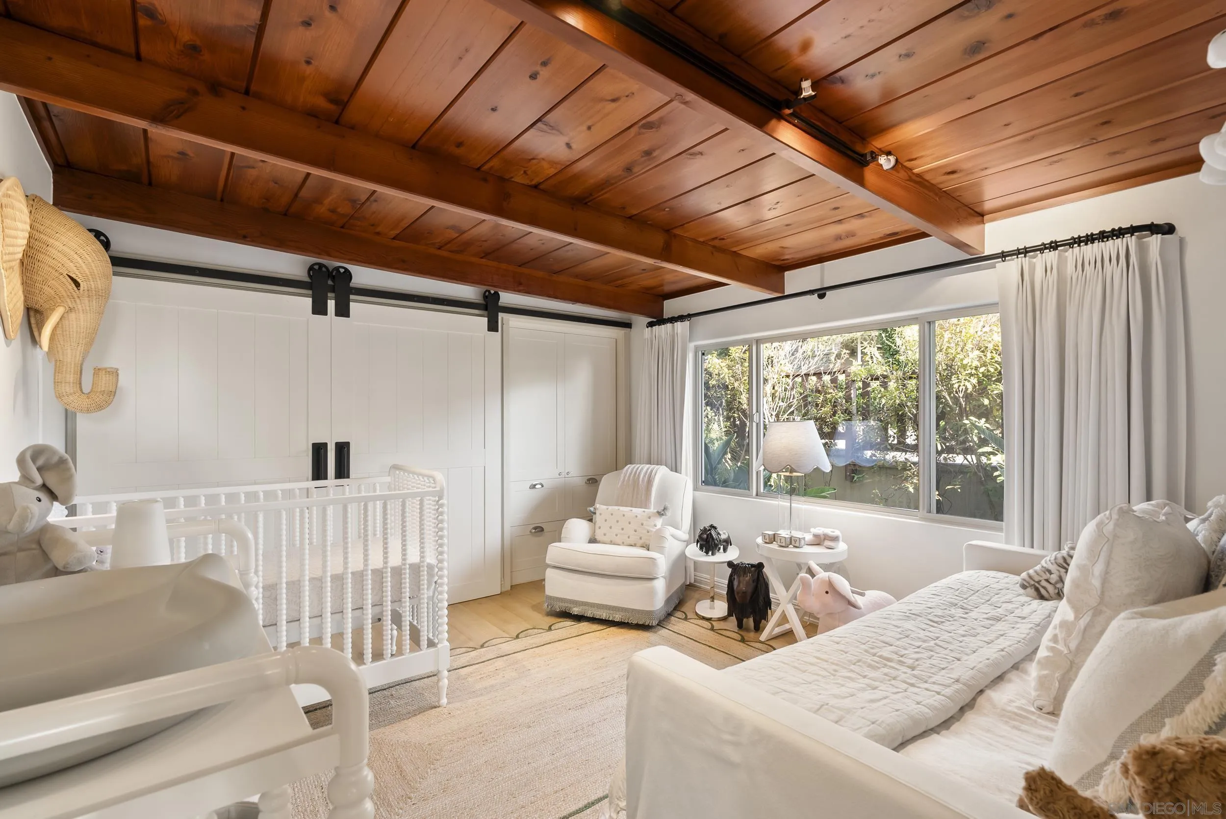 520 10th Street Del Mar, CA 92014 - Photo 7 of 9 a living room with furniture and a large window