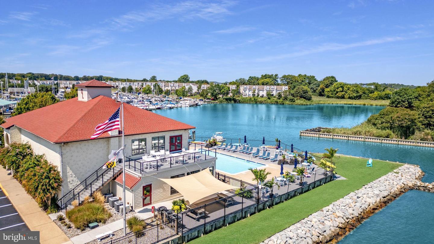 34 Queen Anne Way, Unit F Chester, MD 21619 - Photo 13 of 21 an aerial view of a house with a lake view