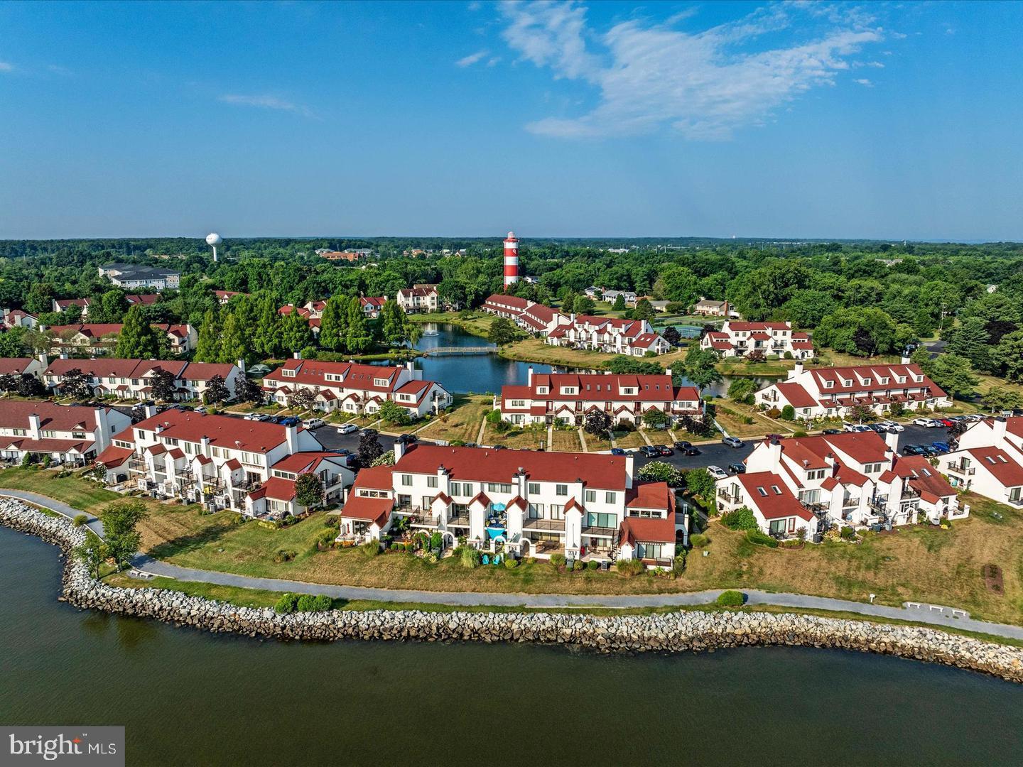 34 Queen Anne Way, Unit F Chester, MD 21619 - Photo 3 of 21 a view of a city with lots of residential buildings and ocean view