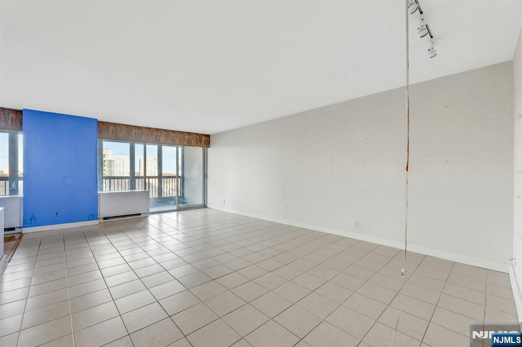 5 Horizon Road, Unit 907 Fort Lee, NJ 07024 - Photo 22 of 48 a view of an empty room with window
