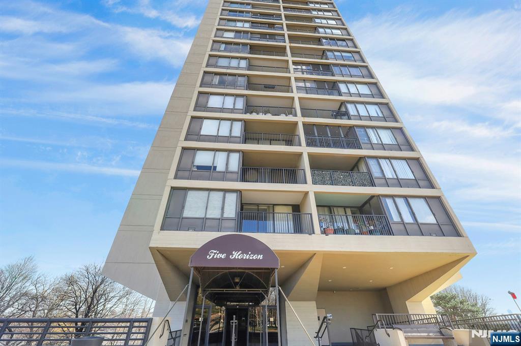 5 Horizon Road, Unit 907 Fort Lee, NJ 07024 - Photo 45 of 48 a front view of a multi story building