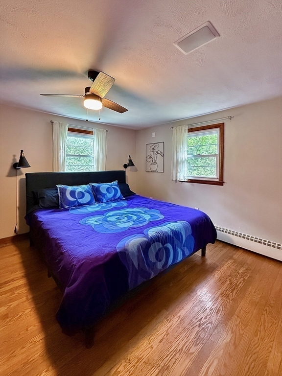 102 Bridge Road Northampton, MA 01062 - Photo 12 of 34 a bedroom with a bed and window