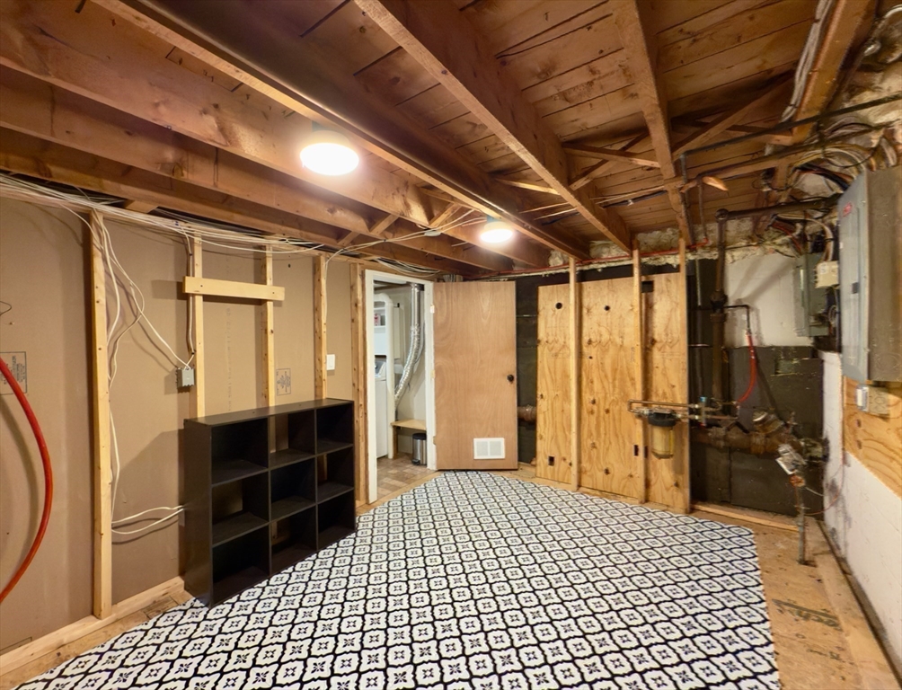 102 Bridge Road Northampton, MA 01062 - Photo 22 of 34 a view of walk in closet with wooden floor