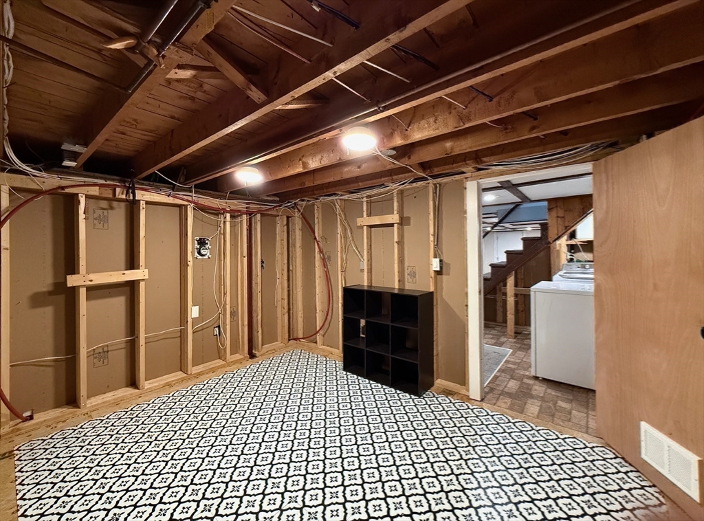 102 Bridge Road Northampton, MA 01062 - Photo 23 of 34 a view of walk in closet with wooden floor