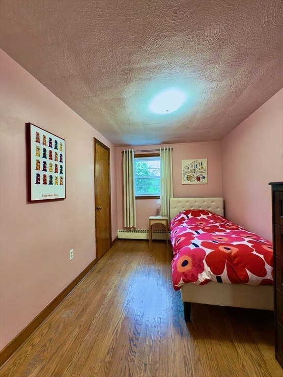 102 Bridge Road Northampton, MA 01062 - Photo 10 of 34 a bedroom with a bed and a window