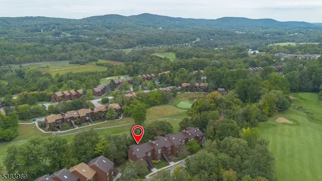 an aerial view of a house with a outdoor space