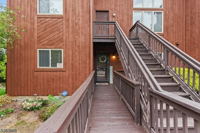 a view of a balcony with staircase