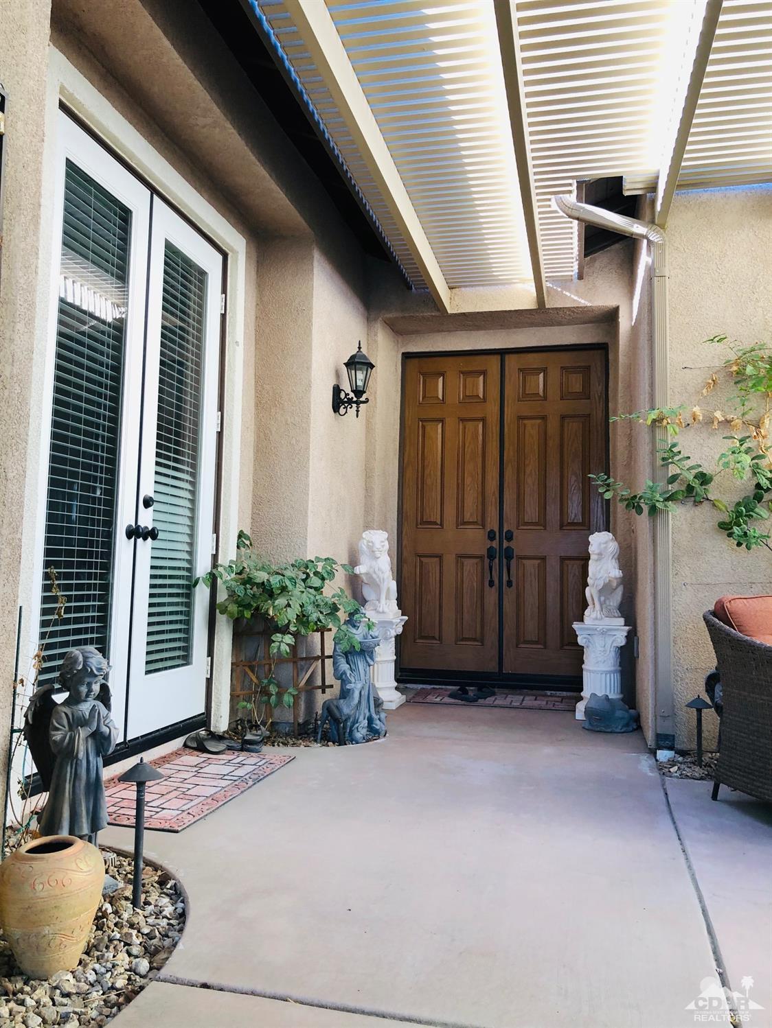 49535 Redford Way Indio, CA 92201 - Photo 3 of 28 a view of entryway front of house
