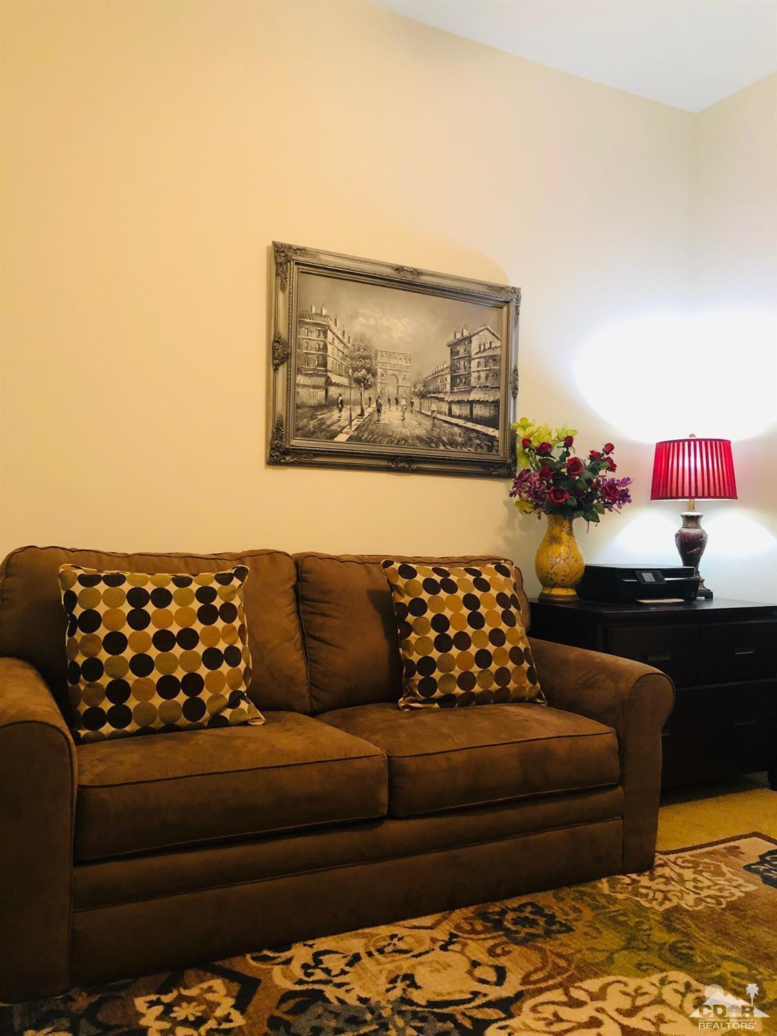 49535 Redford Way Indio, CA 92201 - Photo 23 of 28 a living room with furniture and a couch