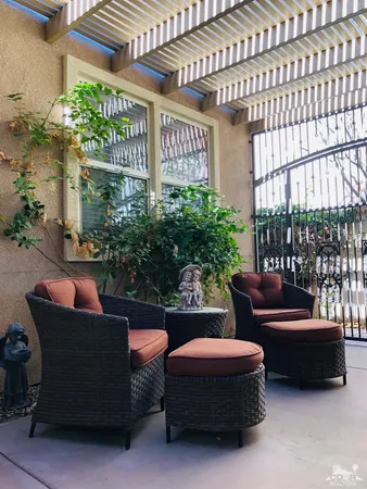 a outdoor living space with furniture and garden view