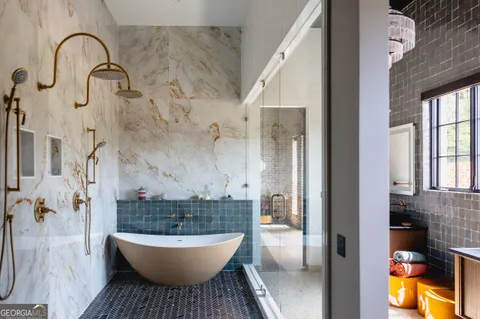 a bathroom with a toilet and a sink