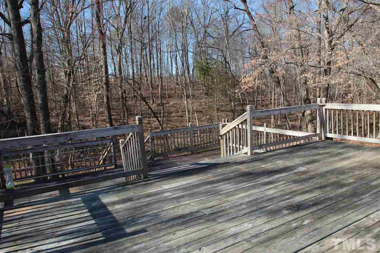 290 Hal Melton Road Roxboro, NC 27574 - Photo 13 of 14 a balcony with wooden floor