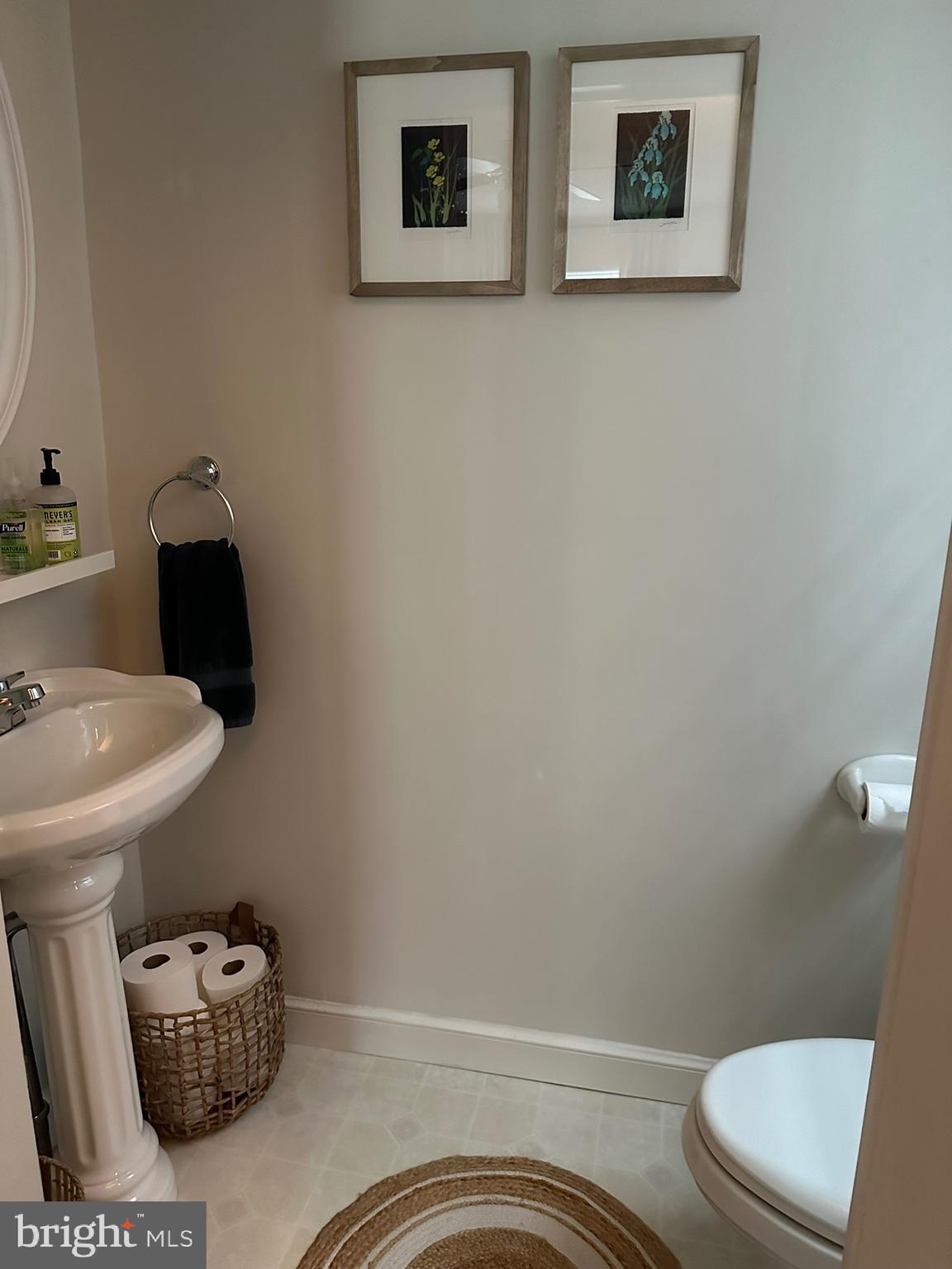 120 Richmond Road Paoli, PA 19301 - Photo 12 of 15 a bathroom with a toilet sink and mirror