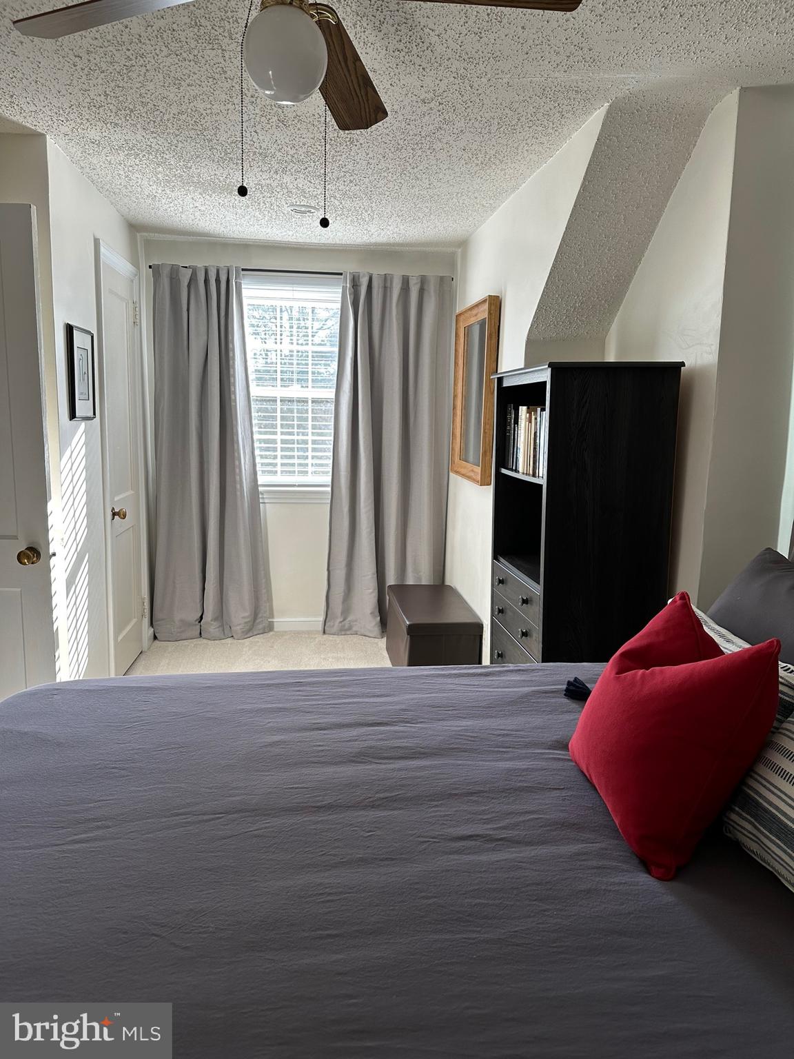 120 Richmond Road Paoli, PA 19301 - Photo 13 of 15 a view of an empty room with wooden floor and a window