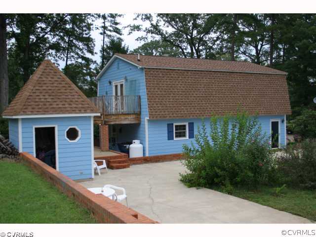 15018 Harrowgate Road Chester, VA 23831 - Photo 3 of 12 a view of a house with a yard