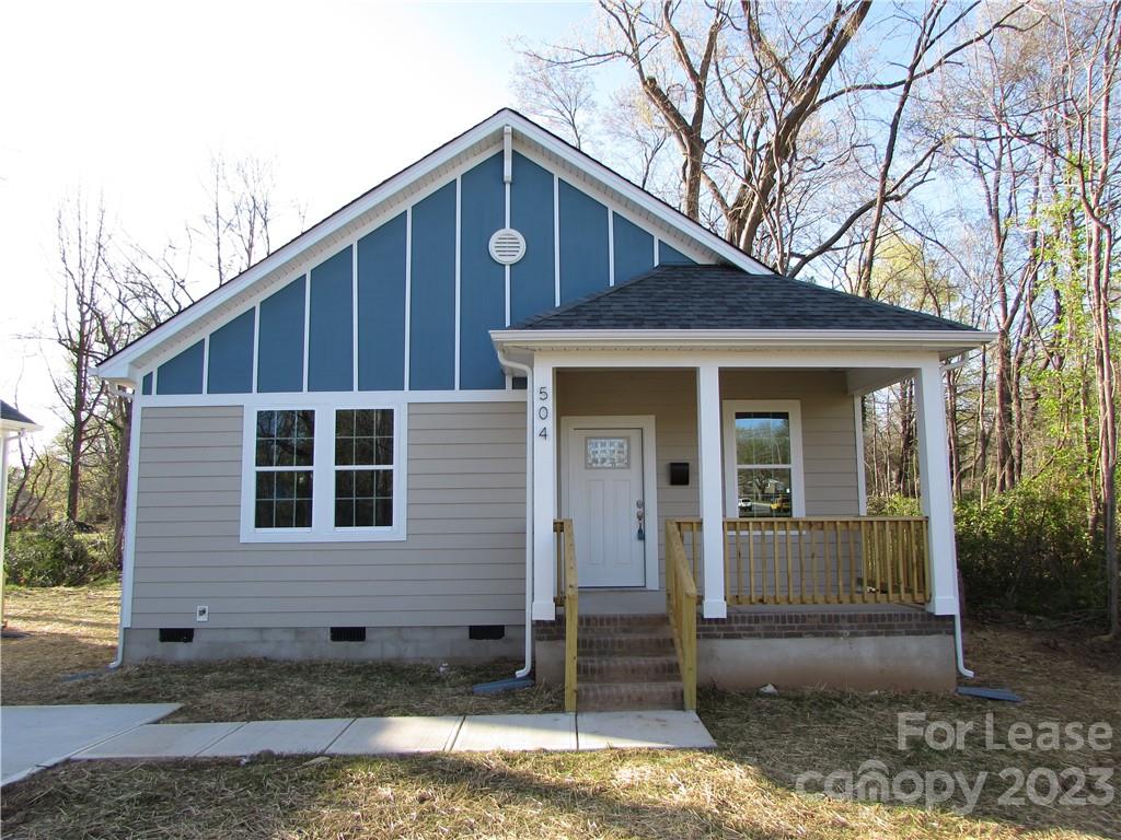 504 Messner Street, Unit 5 Salisbury, NC 28144 - Photo 1 of 11 a view of a house with a yard