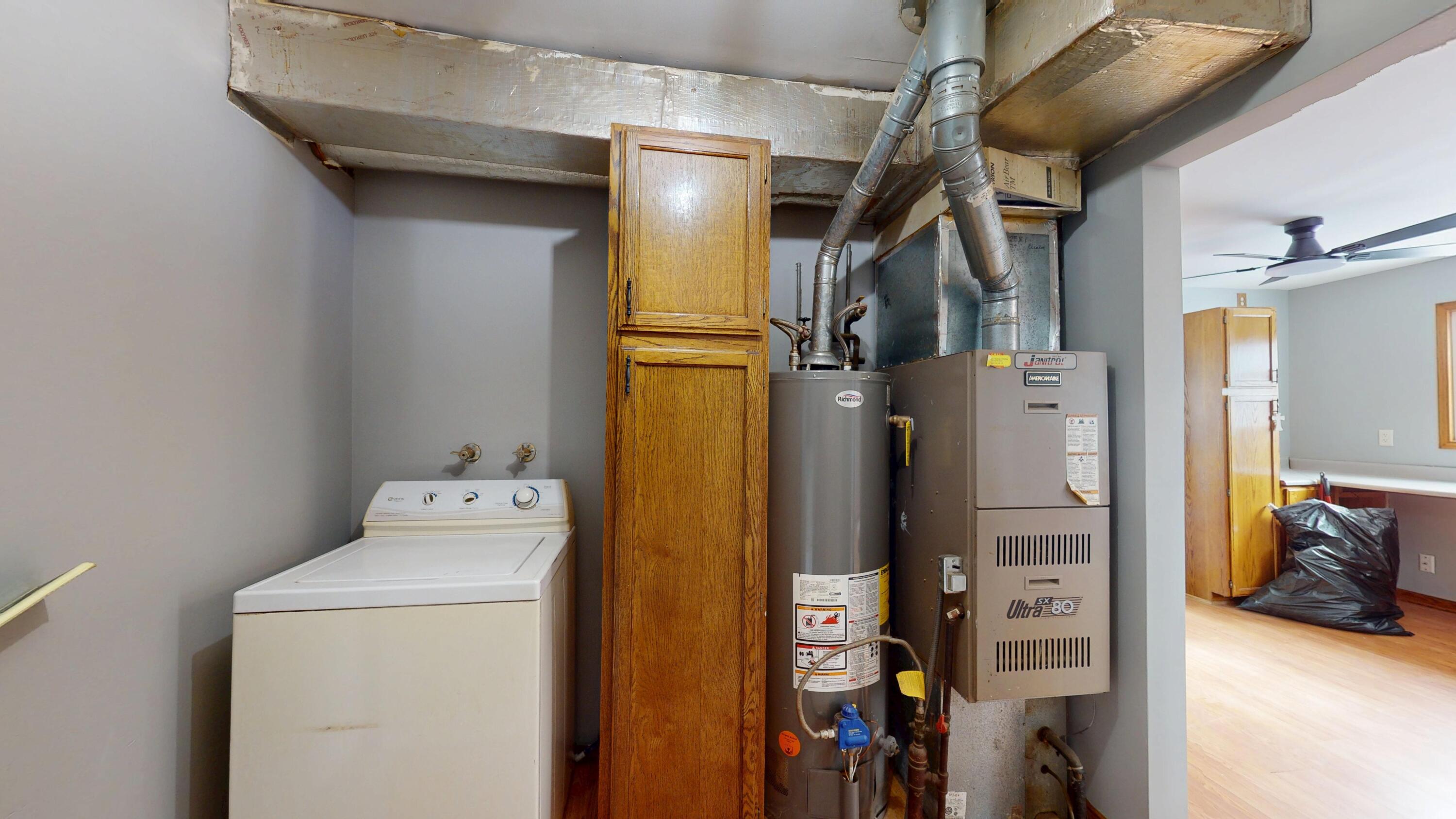 734-1 Juniper Road Valparaiso, IN 46385 - Photo 12 of 34 a utility room with dryer and washer