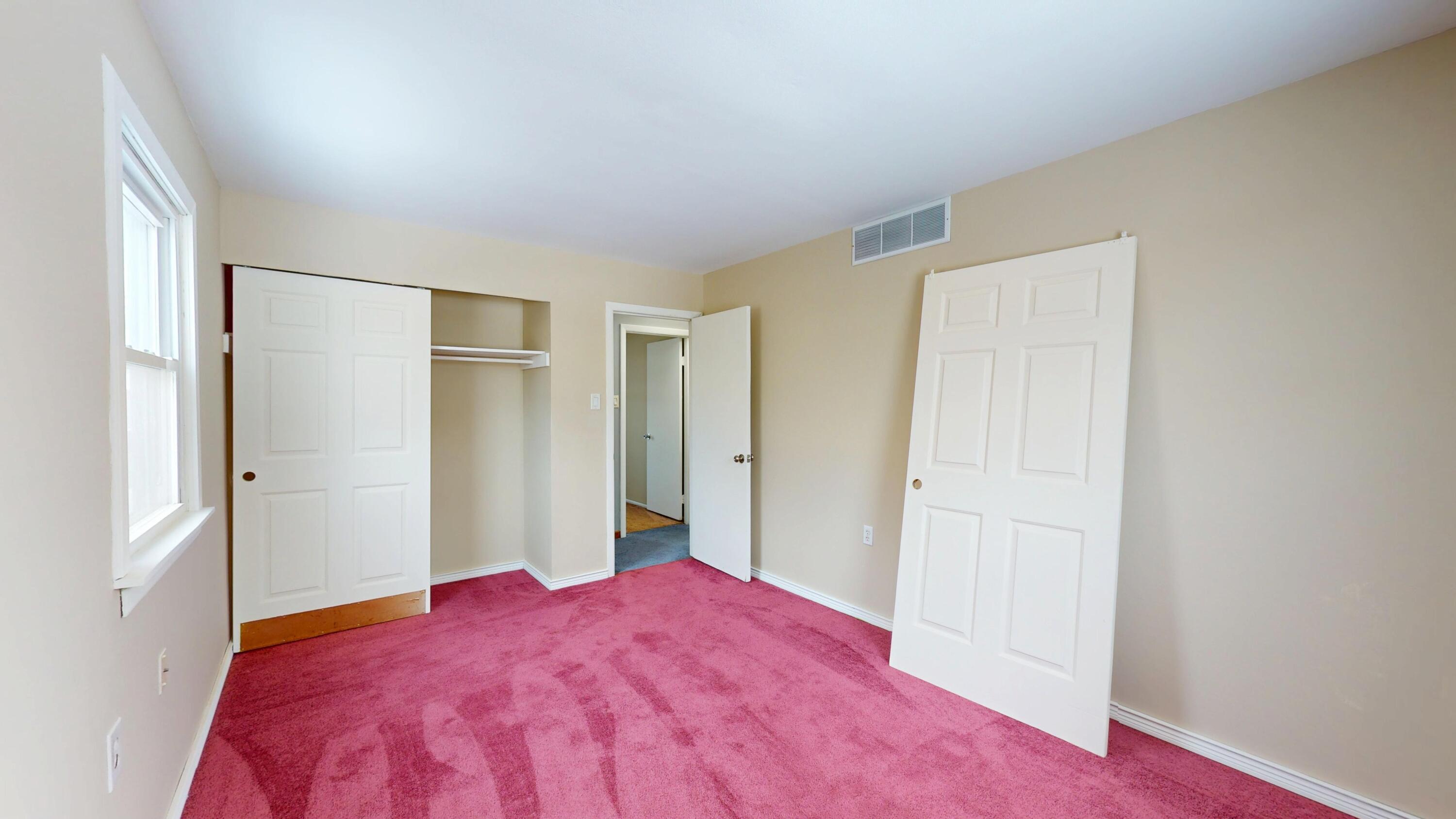 734-1 Juniper Road Valparaiso, IN 46385 - Photo 17 of 34 a bedroom with a bed and a closet