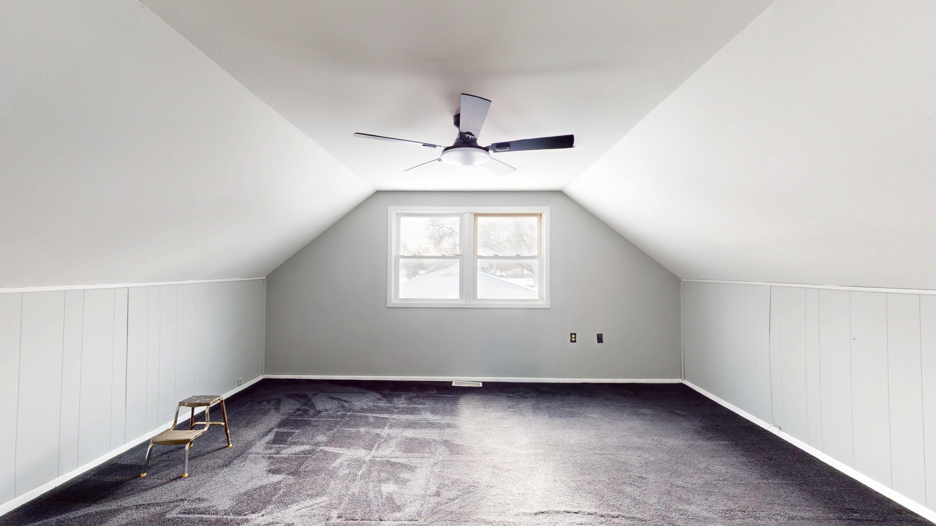 734-1 Juniper Road Valparaiso, IN 46385 - Photo 28 of 34 an empty room with a window and a ceiling fan