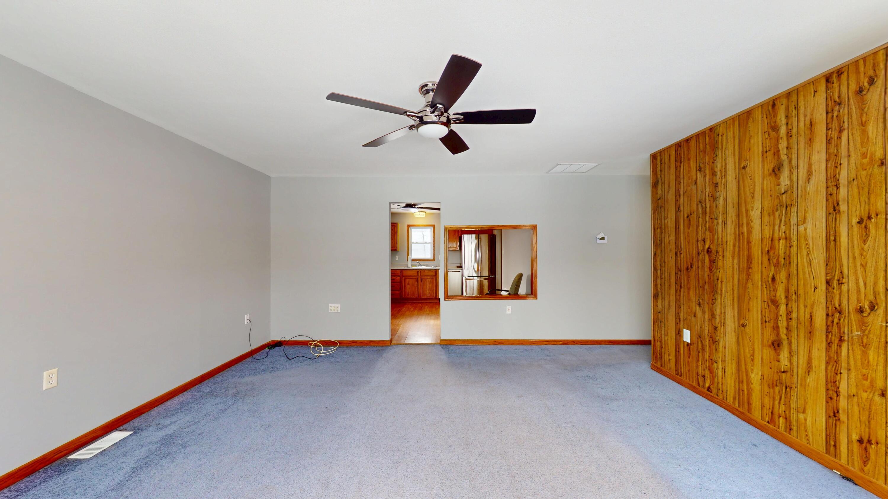 734-1 Juniper Road Valparaiso, IN 46385 - Photo 5 of 34 a view of empty room with ceiling fan