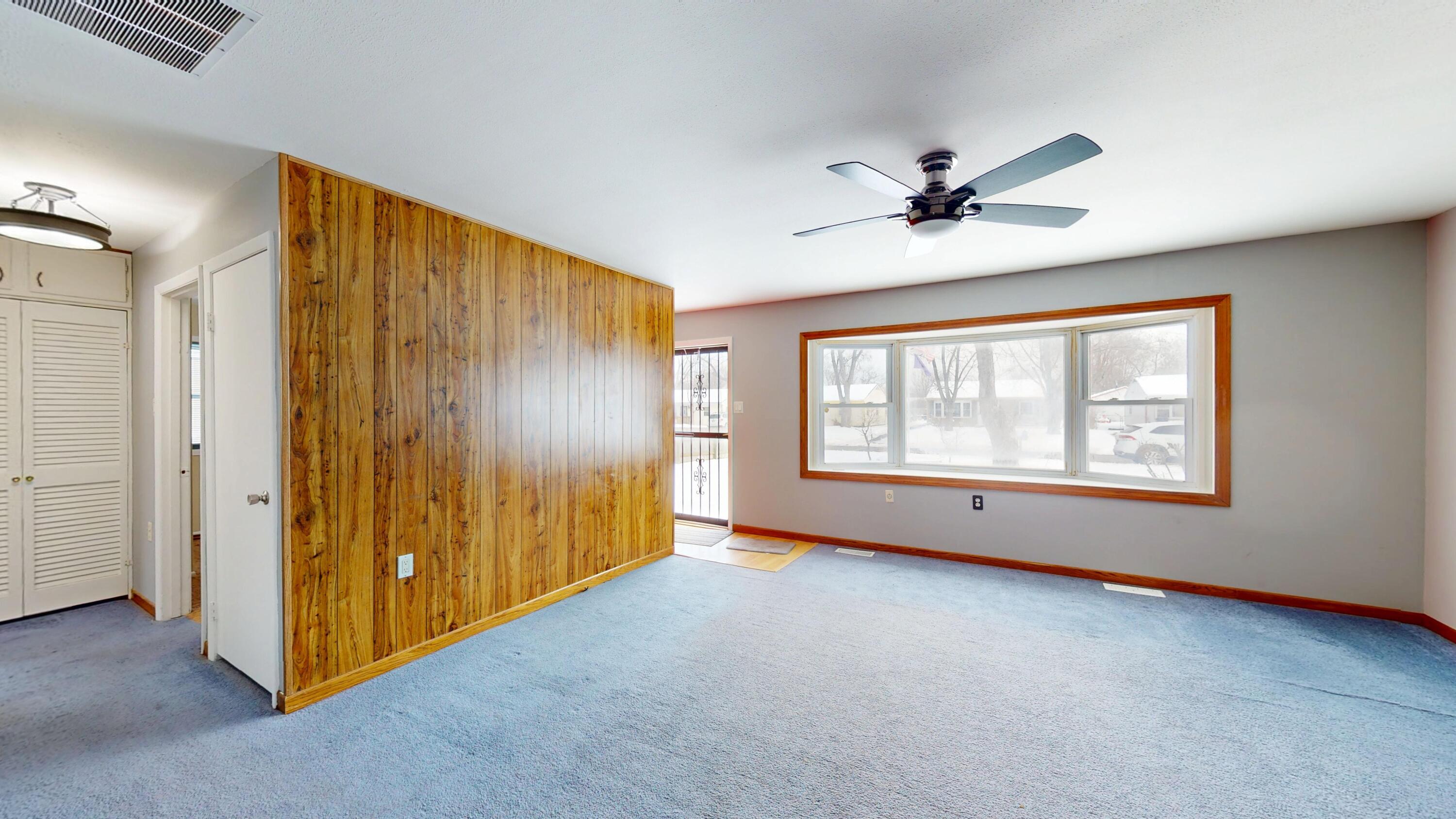 734-1 Juniper Road Valparaiso, IN 46385 - Photo 7 of 34 wooden floor in an empty room with a window