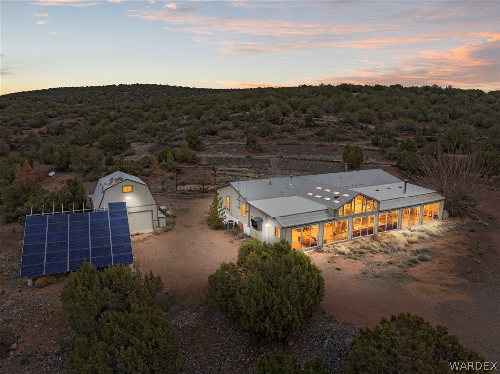 3894 North Lookout Canyon Road Kingman, AZ 86401 - Photo 1 of 64 Drone / aerial view of a heavily wooded area