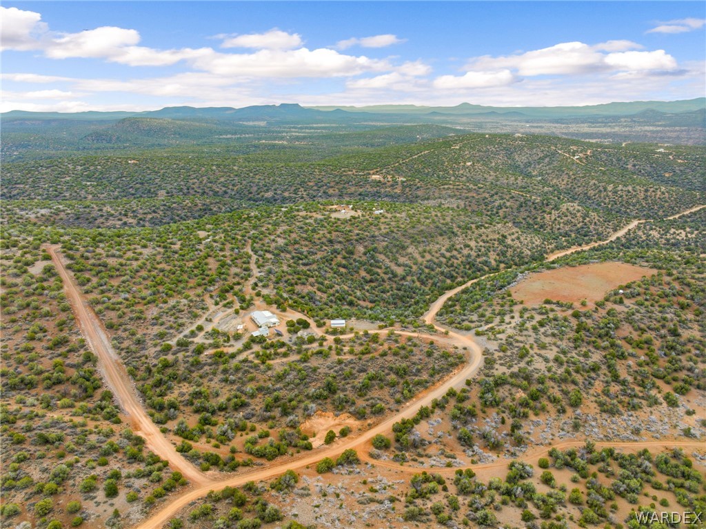 3894 North Lookout Canyon Road Kingman, AZ 86401 - Photo 53 of 64 Overview of rural landscape featuring a mountainous background and a desert landscape