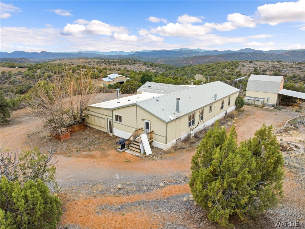 3894 North Lookout Canyon Road Kingman, AZ 86401 - Photo 5 of 64 Drone / aerial view of a mountainous background