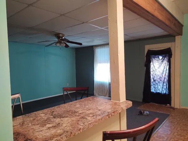 a room with furniture and window