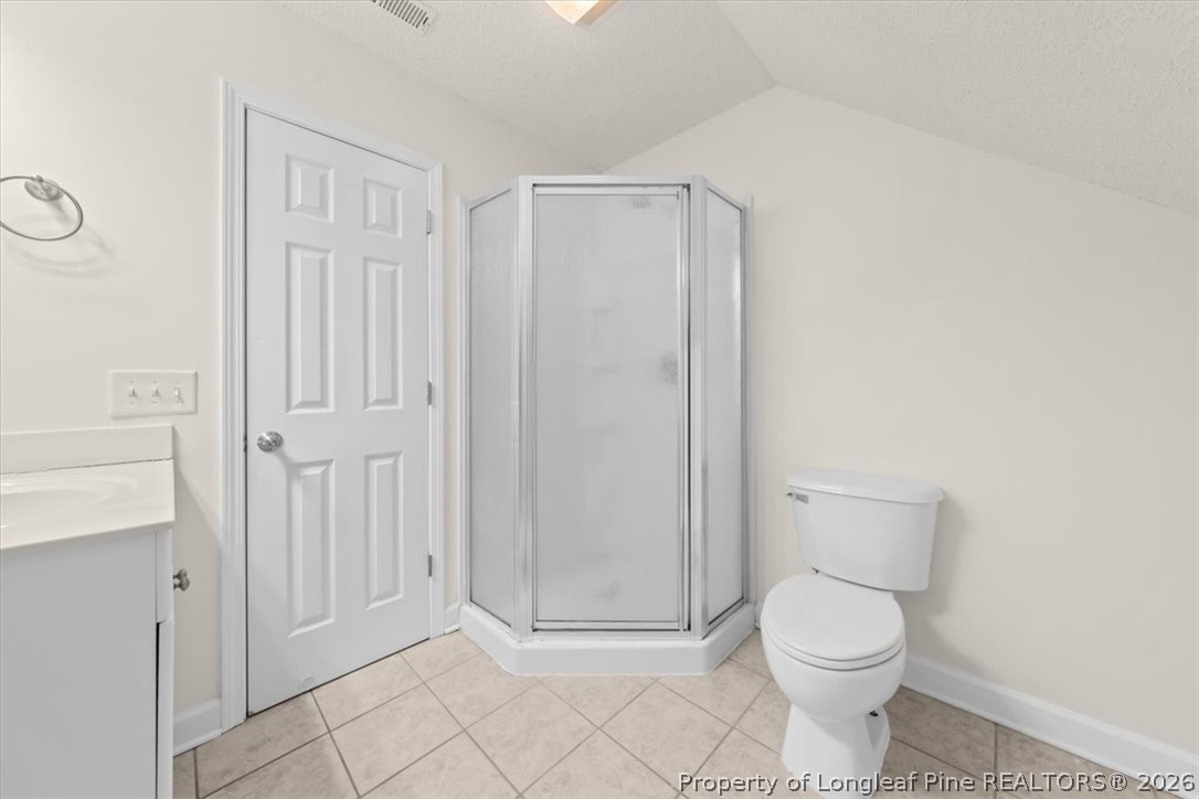 60 Spring Lake Drive Pinehurst, NC 28374 - Photo 28 of 42 a bathroom with a toilet a sink