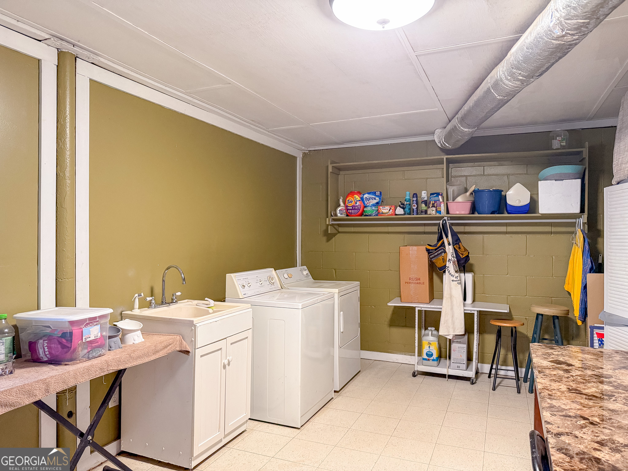 1003 Highway 27 Americus, GA 31709 - Photo 21 of 35 a room with storage and utility