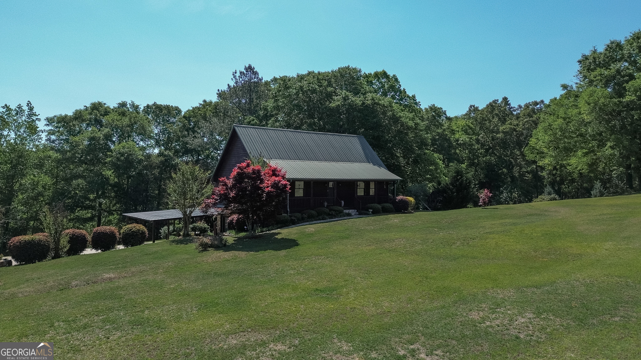 1003 Highway 27 Americus, GA 31709 - Photo 3 of 48 a view of a sitting area in front of a house