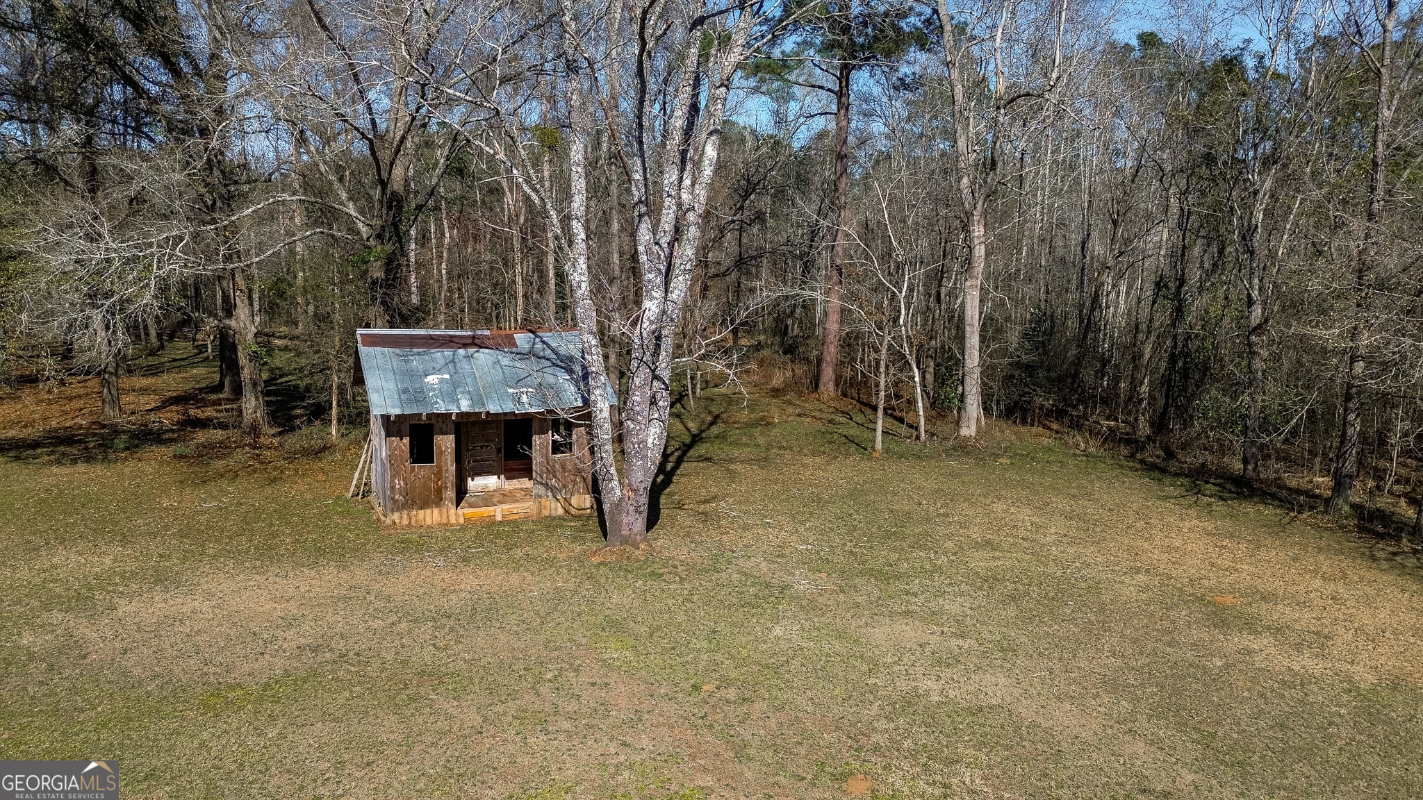 1003 Highway 27 Americus, GA 31709 - Photo 31 of 35 a view of a house with a yard