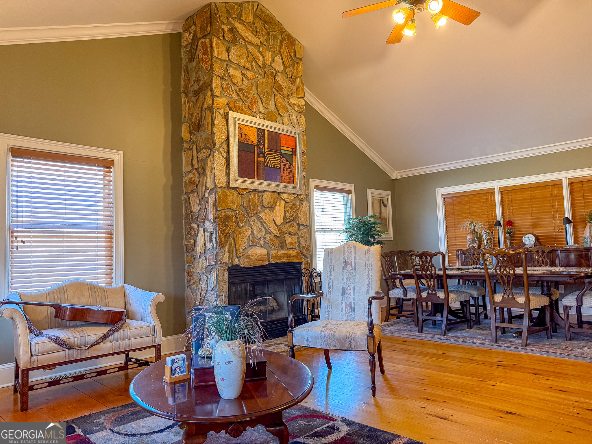 1003 Highway 27 Americus, GA 31709 - Photo 8 of 48 a living room with fireplace furniture and a large window