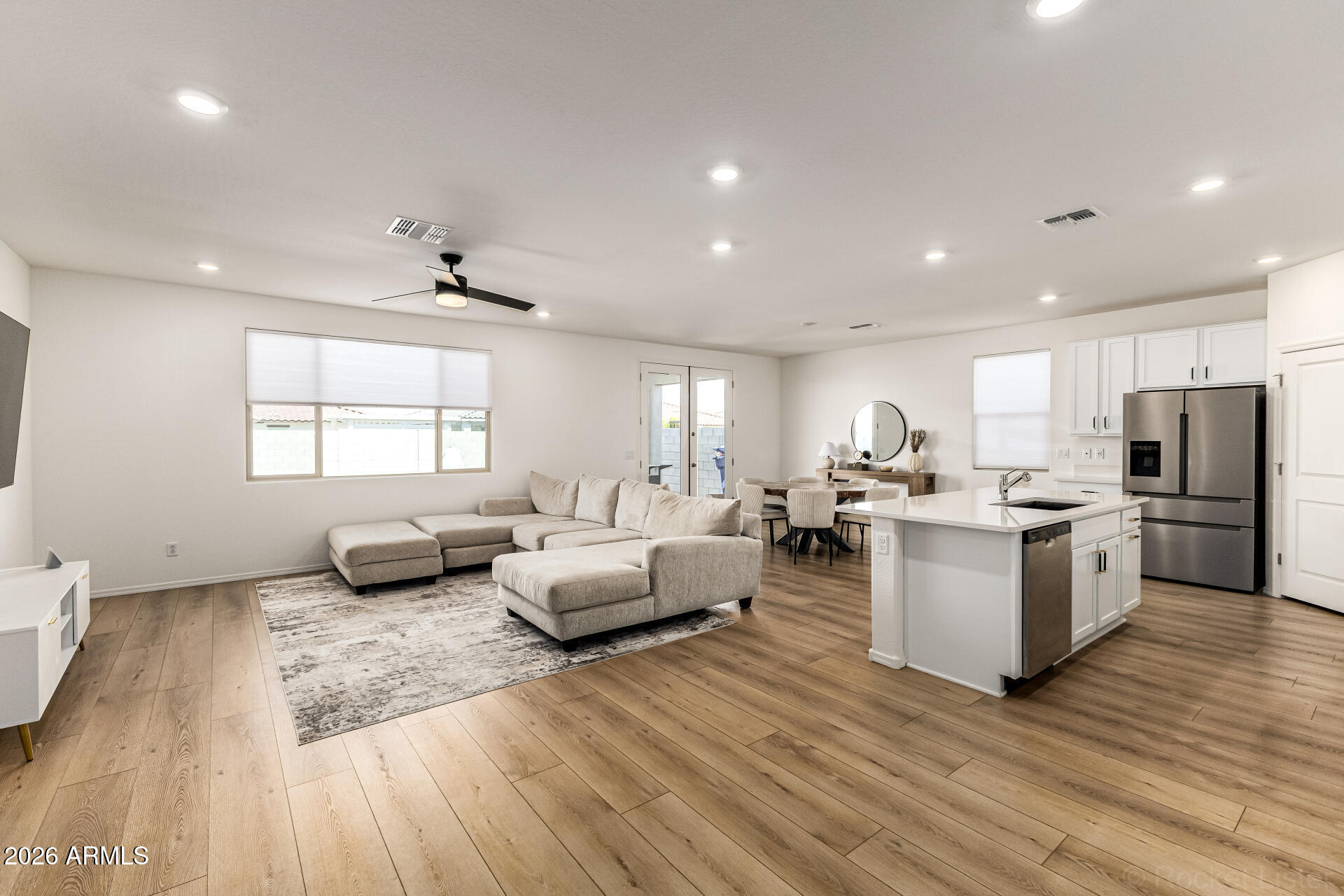 3022 West Estes Way Laveen, AZ 85339 - Photo 12 of 37 a living room with furniture and a wooden floor