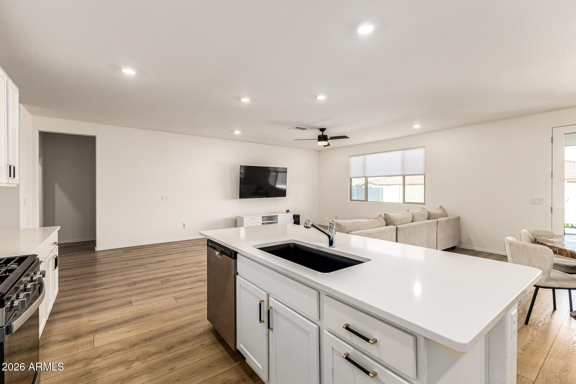3022 West Estes Way Laveen, AZ 85339 - Photo 17 of 37 a living room with furniture and flat screen tv