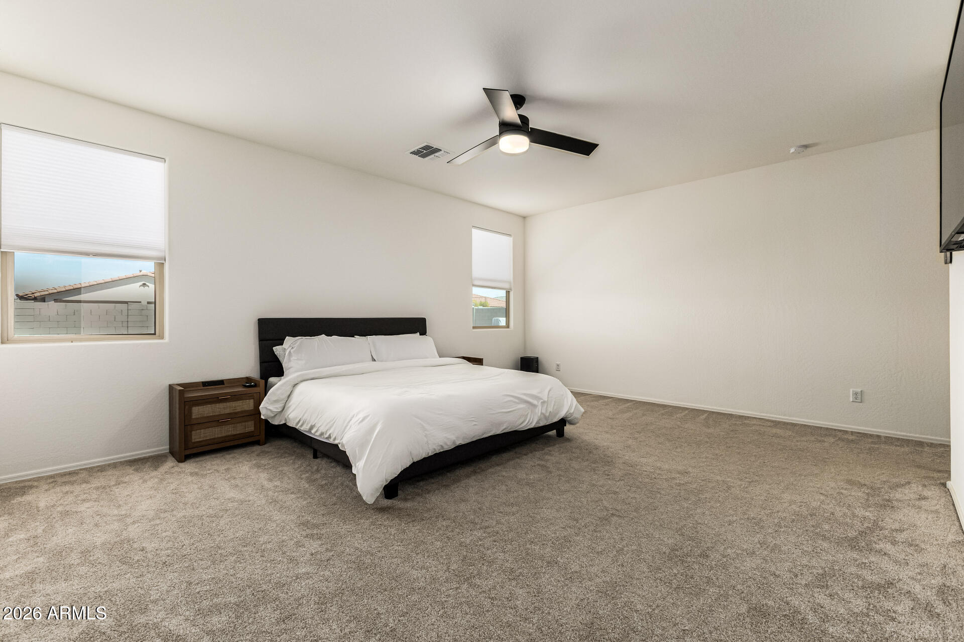 3022 West Estes Way Laveen, AZ 85339 - Photo 22 of 37 a bedroom with a bed and window