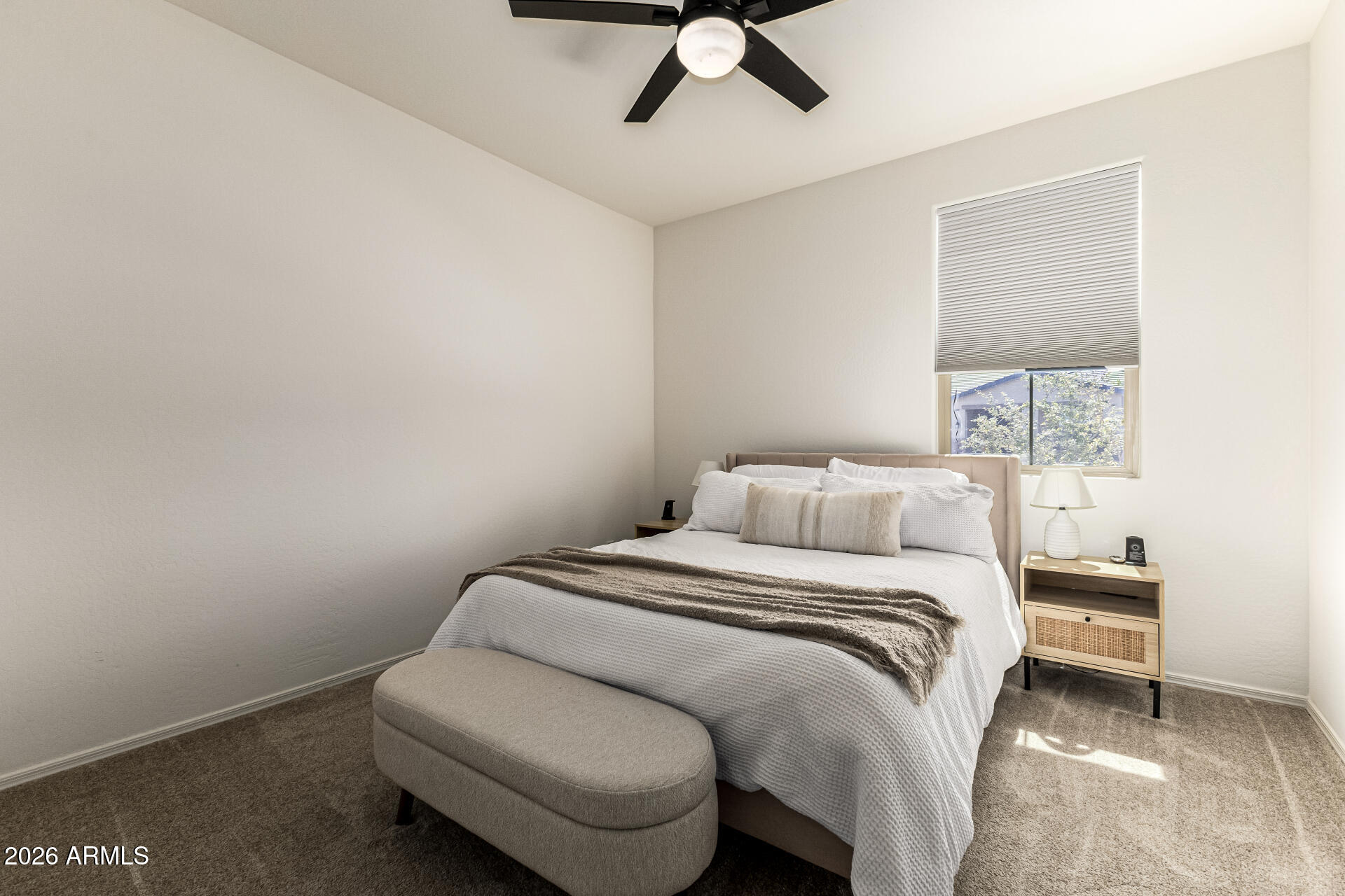 3022 West Estes Way Laveen, AZ 85339 - Photo 27 of 37 a bedroom with a bed and window