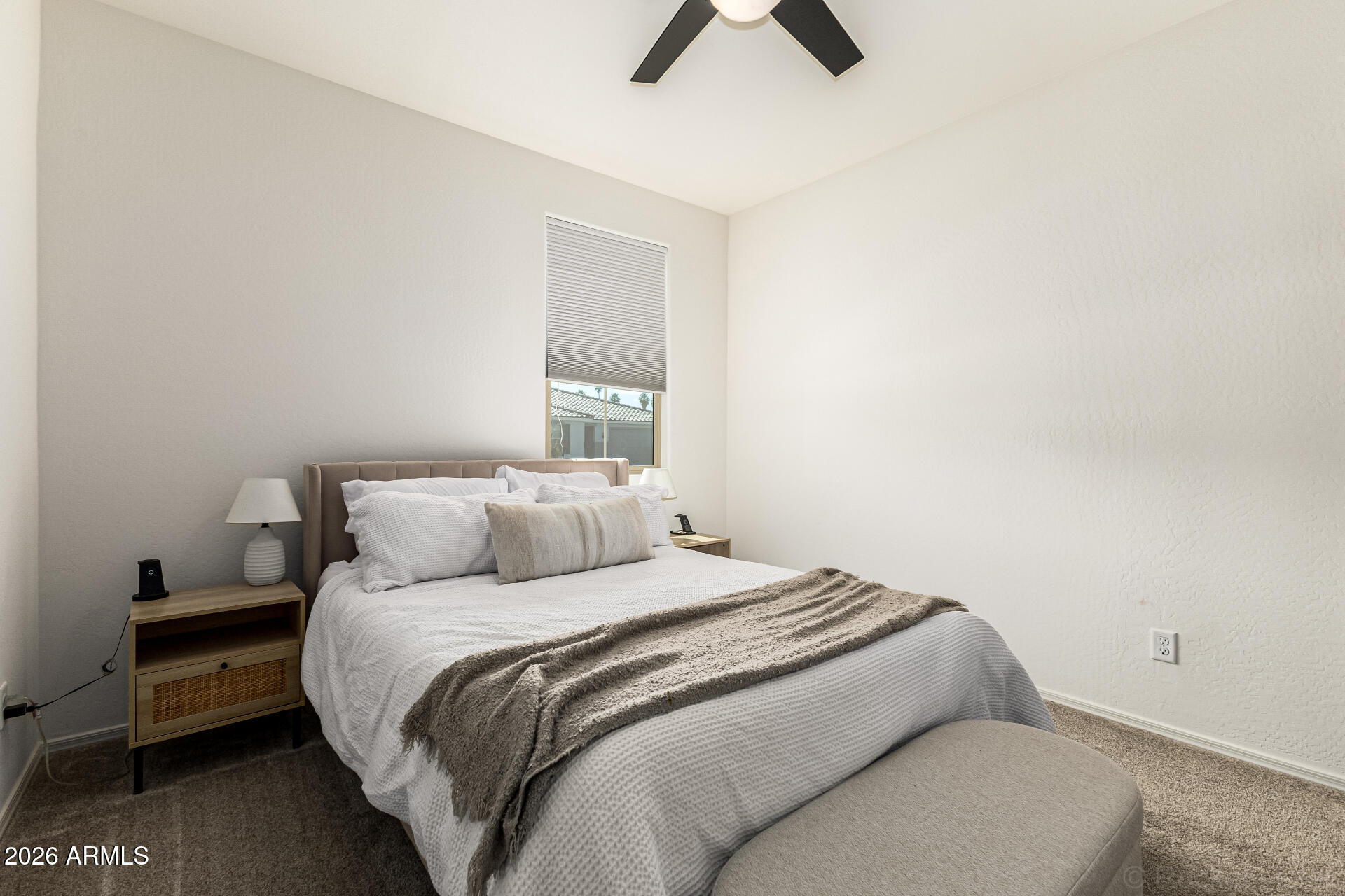 3022 West Estes Way Laveen, AZ 85339 - Photo 28 of 37 a bedroom with a bed and painting on the wall