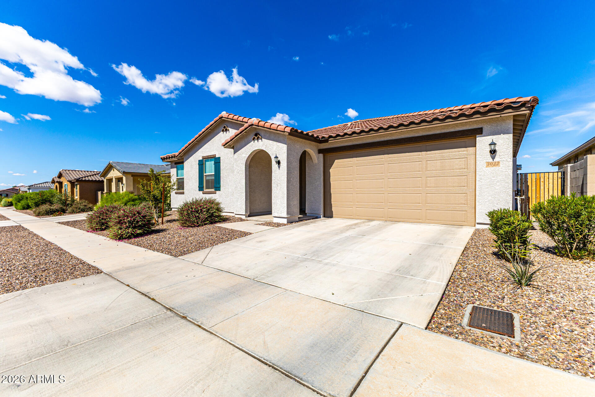 3022 West Estes Way Laveen, AZ 85339 - Photo 3 of 37 a front view of a house with a yard