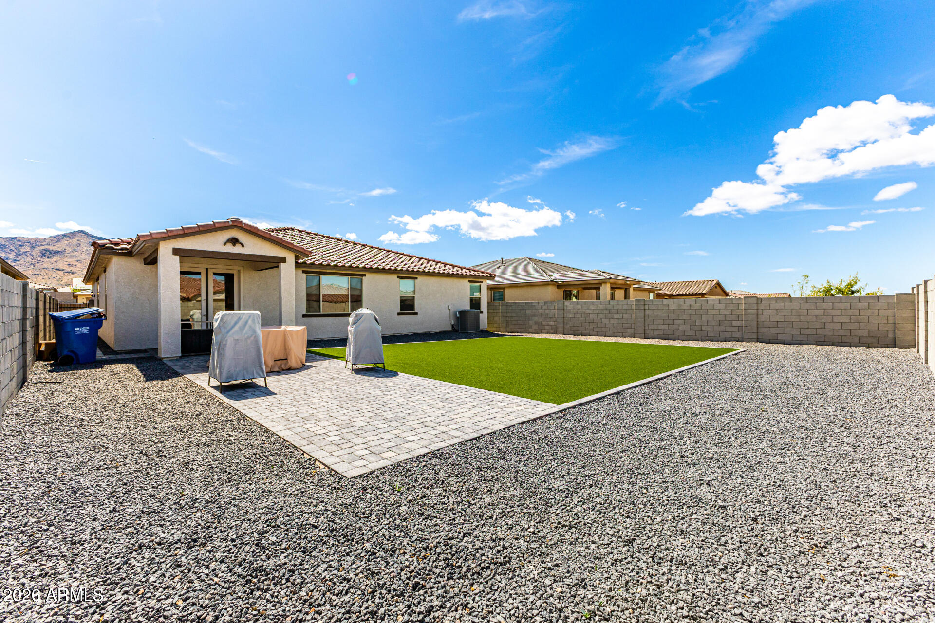 3022 West Estes Way Laveen, AZ 85339 - Photo 36 of 37 a view of a house with a yard and sitting area