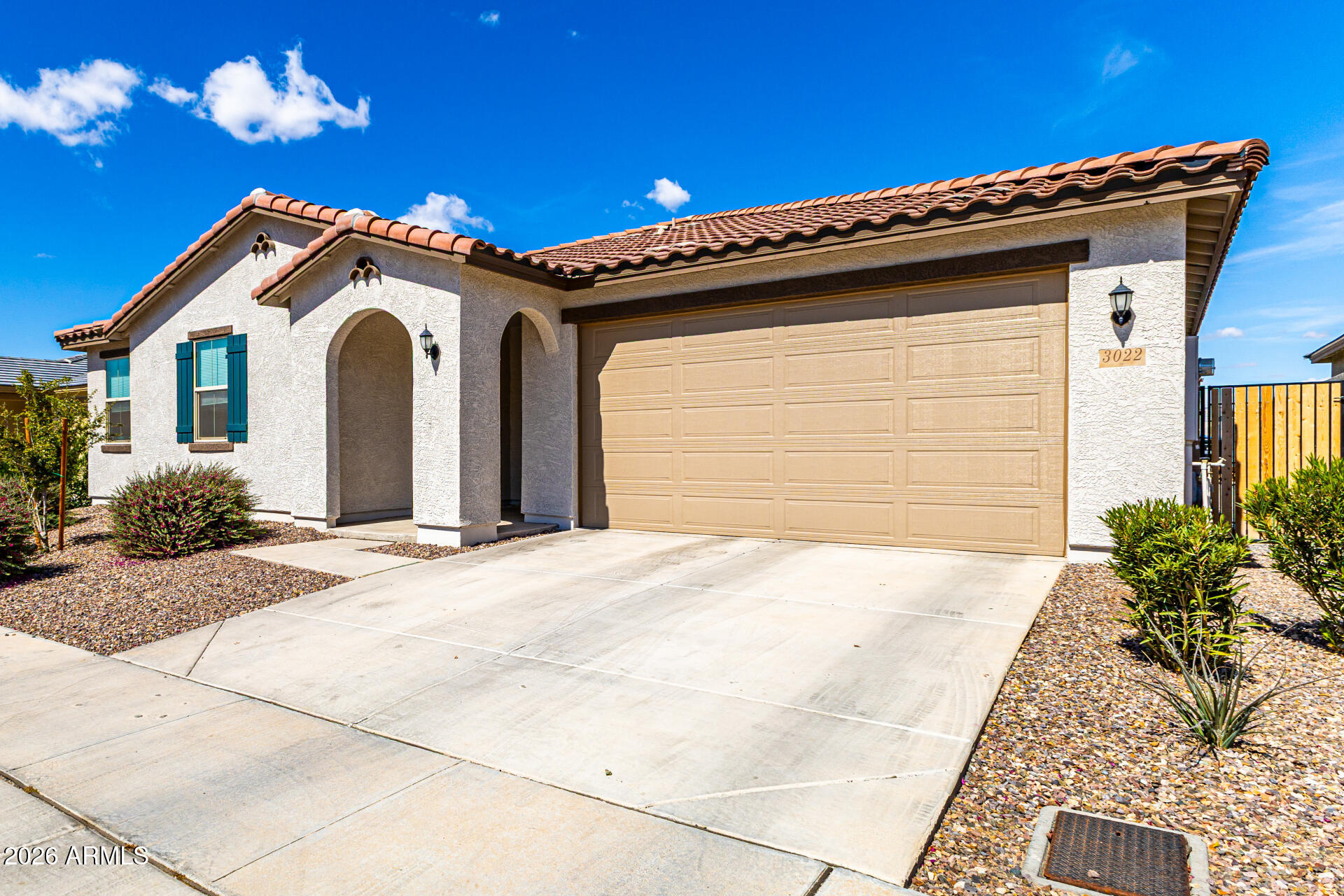 3022 West Estes Way Laveen, AZ 85339 - Photo 4 of 37 a view of entryway with a flower garden in front of it
