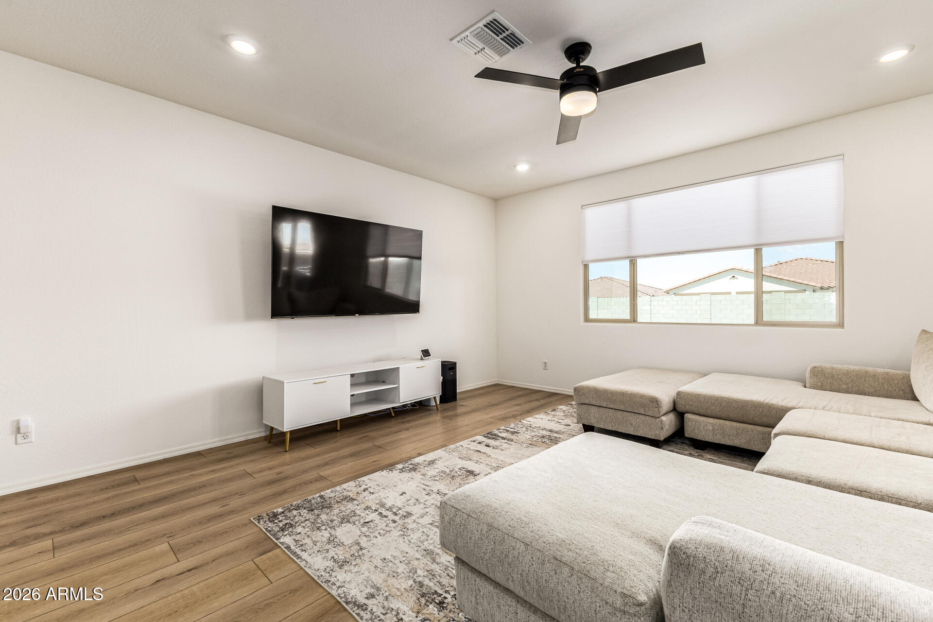 3022 West Estes Way Laveen, AZ 85339 - Photo 8 of 37 a living room with furniture and a flat screen tv