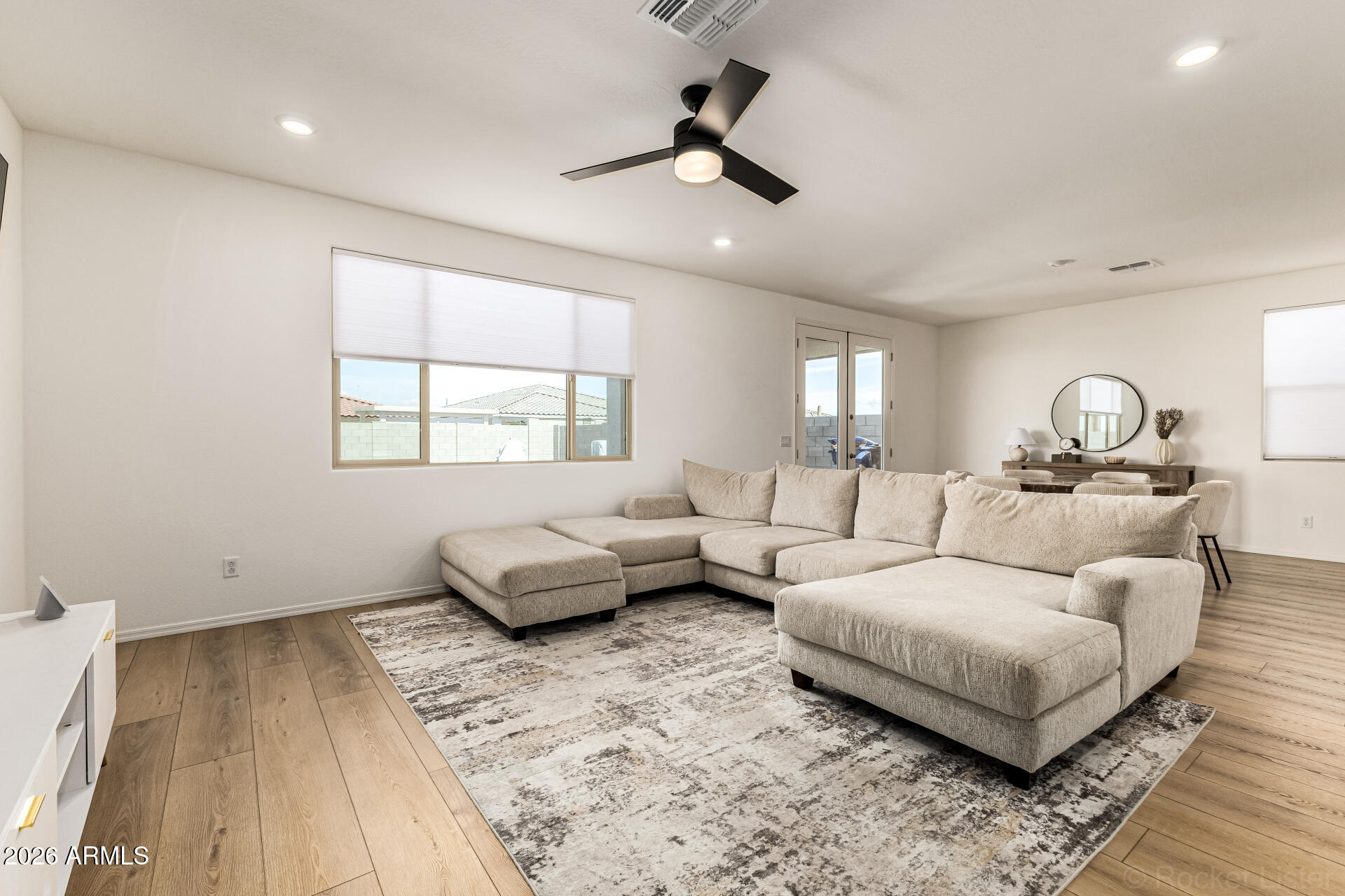3022 West Estes Way Laveen, AZ 85339 - Photo 9 of 37 a living room with furniture and a window